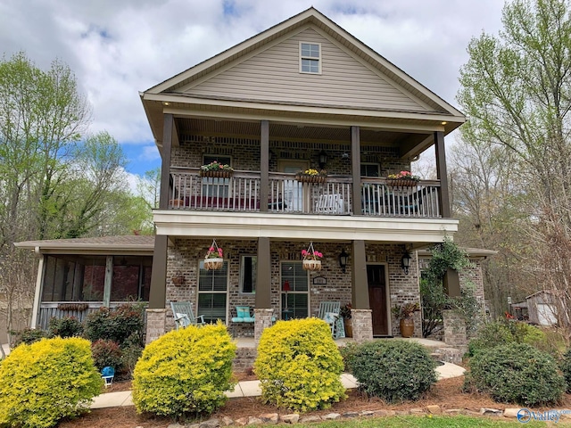 view of front of home with a balcony