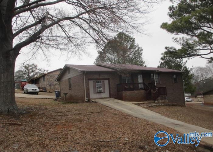 single story home with brick siding