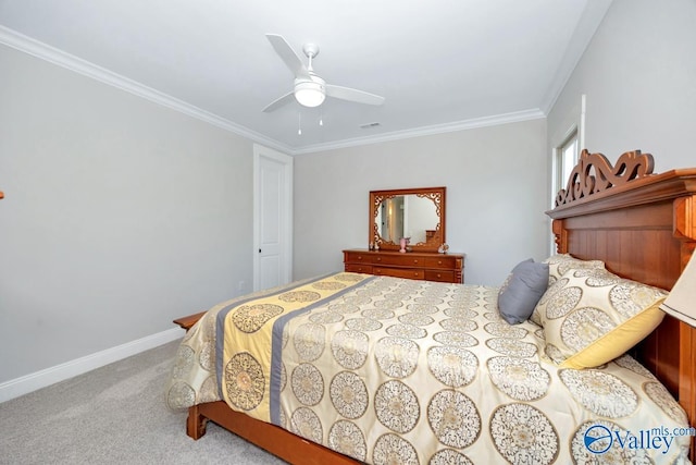 bedroom featuring crown molding, a ceiling fan, visible vents, baseboards, and carpet flooring