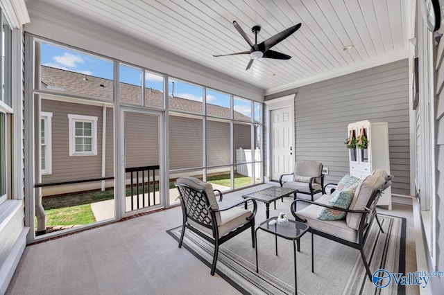 sunroom / solarium with an outdoor hangout area and a ceiling fan