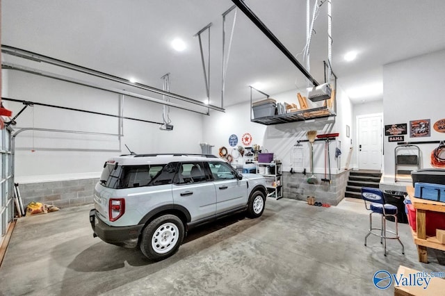 garage featuring a garage door opener