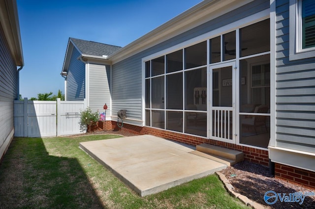 view of patio / terrace with fence and a gate
