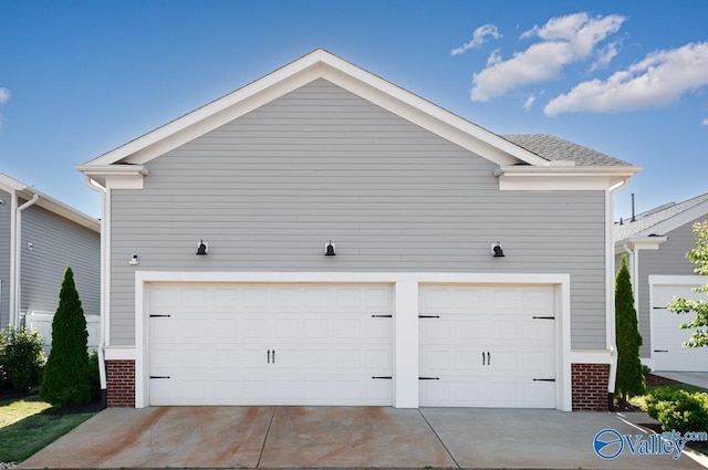 exterior space with a garage