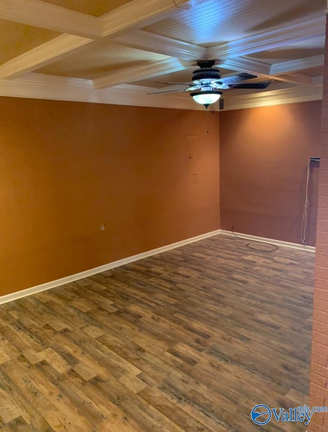 unfurnished room featuring a ceiling fan, wood finished floors, coffered ceiling, beamed ceiling, and baseboards