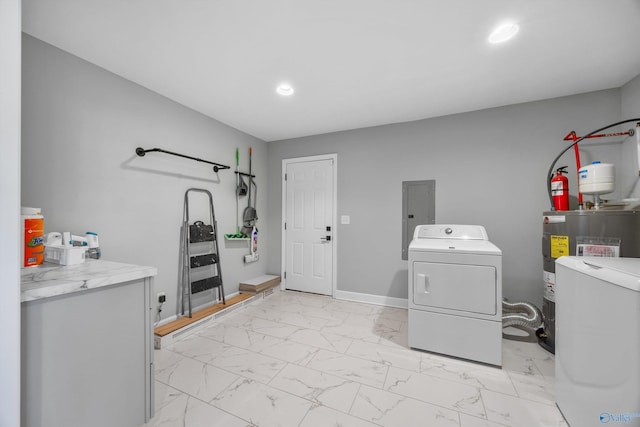 laundry area with electric panel, washer and clothes dryer, and electric water heater