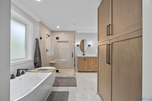 bathroom featuring vanity, crown molding, and plus walk in shower