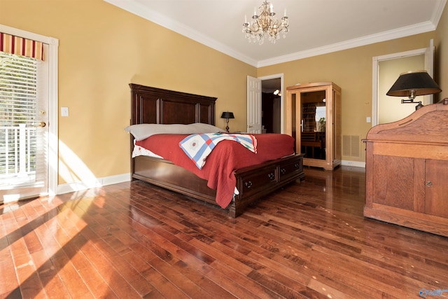 bedroom with a chandelier, crown molding, and dark wood-type flooring