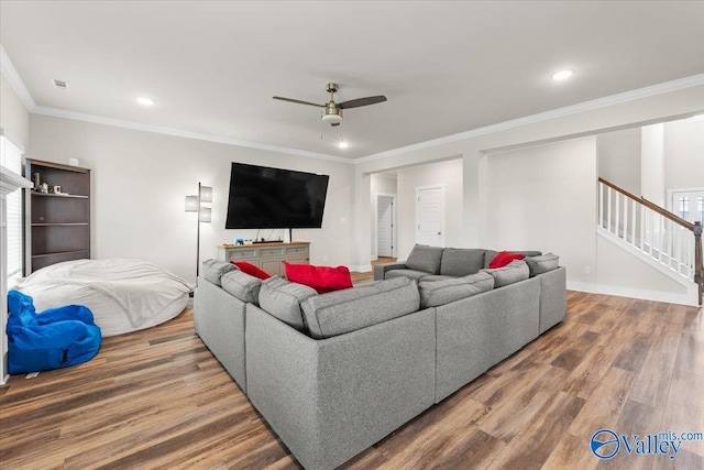 246 Tybee Dr, Madison, AL 35756 - living room with a ceiling fan, wood finished floors, stairs, crown molding, and recessed lighting