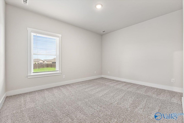 246 Tybee Dr, Madison, AL 35756 - spare room with baseboards and carpet