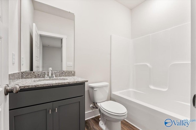 246 Tybee Dr, Madison, AL 35756 - bathroom with toilet, wood finished floors, vanity, and shower / tub combination
