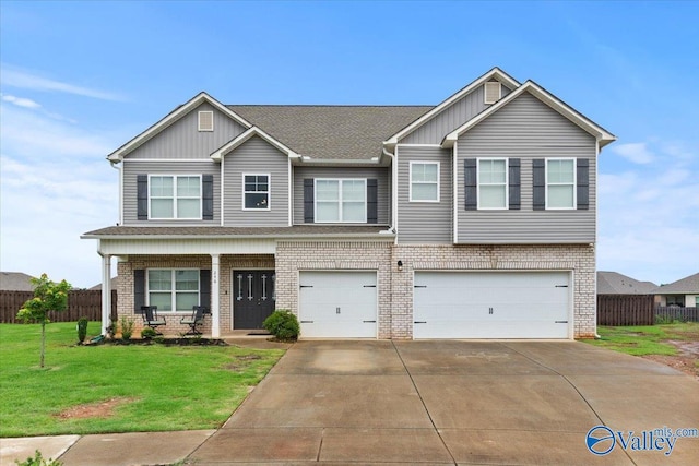246 Tybee Dr, Madison, AL 35756 - view of front of house with brick siding, a garage, a porch, driveway, and board and batten siding