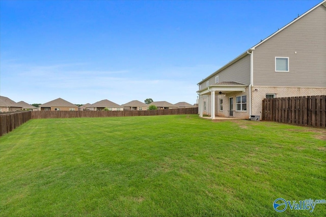 246 Tybee Dr, Madison, AL 35756 - view of yard featuring a ceiling fan and a patio area