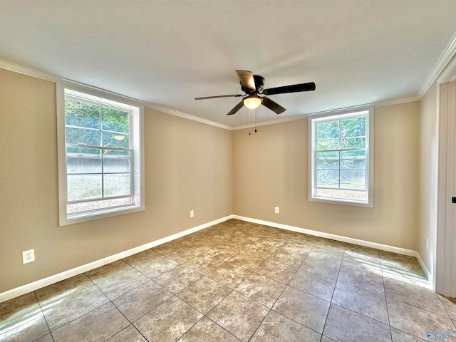 tiled spare room with ceiling fan, ornamental molding, and a wealth of natural light