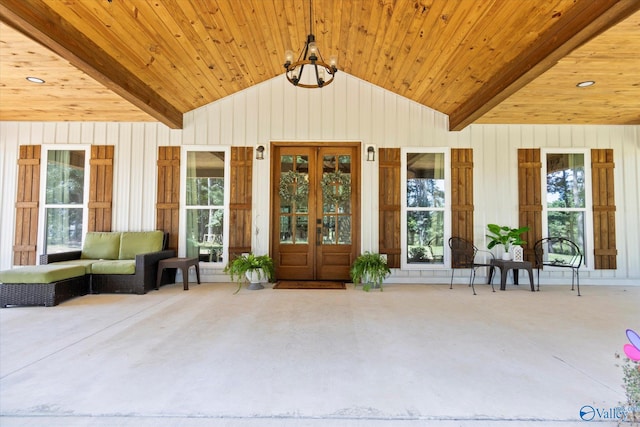 exterior space featuring french doors and outdoor lounge area