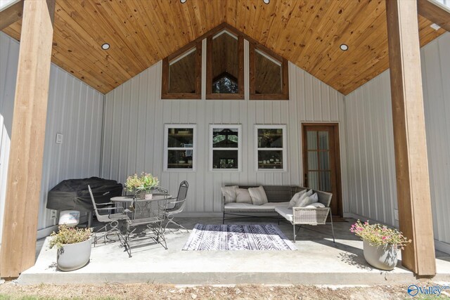 bedroom featuring lofted ceiling, light wood-type flooring, and ceiling fan