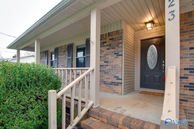 doorway to property with a porch