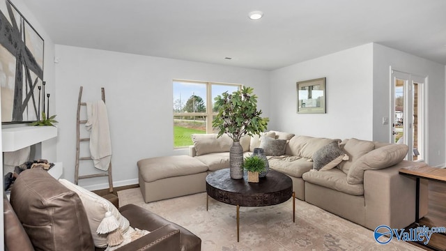 18882 Wicklow Cir, Athens, AL 35613 - living room featuring wood finished floors, baseboards, and recessed lighting
