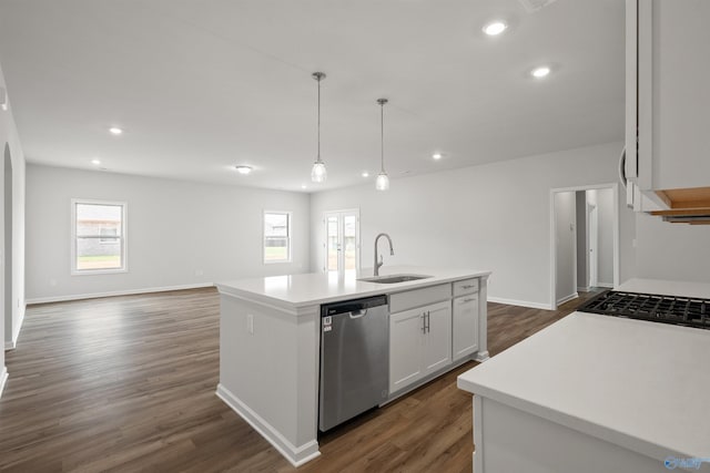 kitchen featuring white cabinets, sink, a center island with sink, dishwasher, and hanging light fixtures