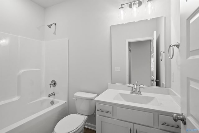 full bathroom featuring vanity, toilet, and washtub / shower combination