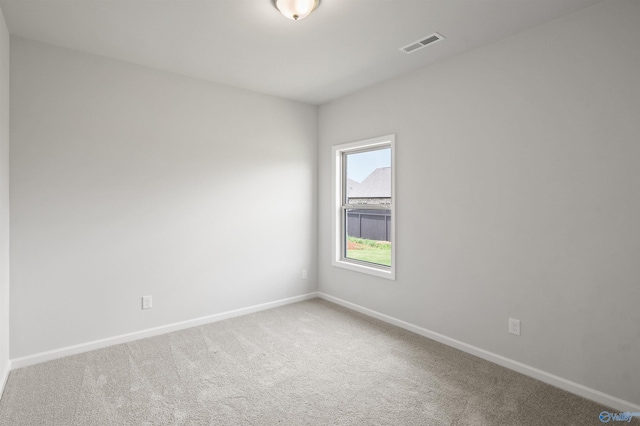 spare room with carpet floors