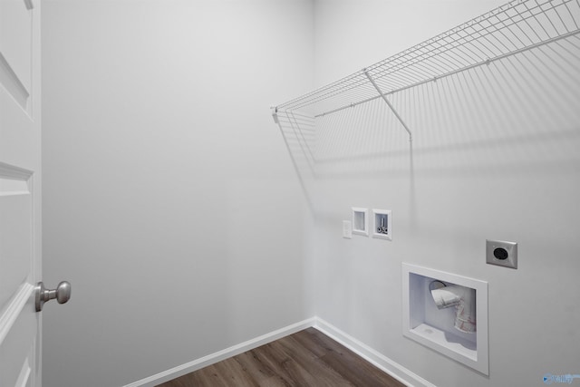 laundry room with hookup for a washing machine, dark wood-type flooring, and hookup for an electric dryer