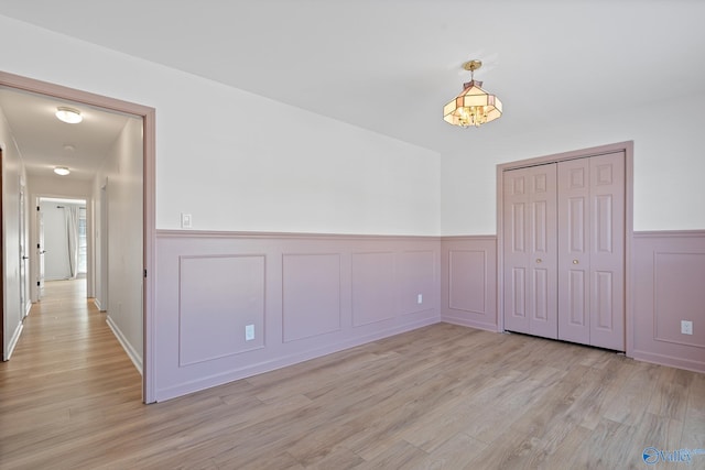 unfurnished room featuring light hardwood / wood-style floors