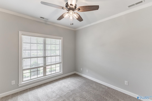 unfurnished room featuring visible vents, baseboards, and ceiling fan