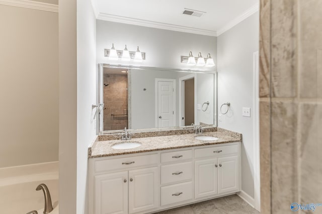 bathroom featuring visible vents, a sink, double vanity, and ornamental molding