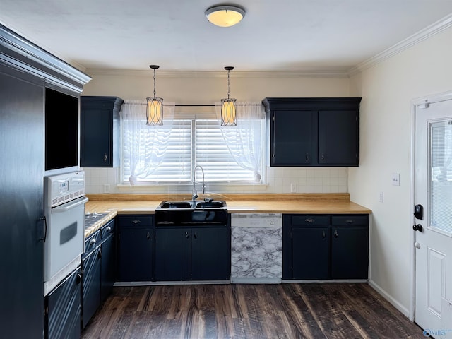 kitchen with dark wood-type flooring, wooden counters, crown molding, pendant lighting, and white appliances