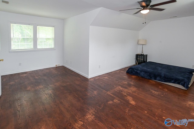 unfurnished bedroom with vaulted ceiling, ceiling fan, and hardwood / wood-style floors