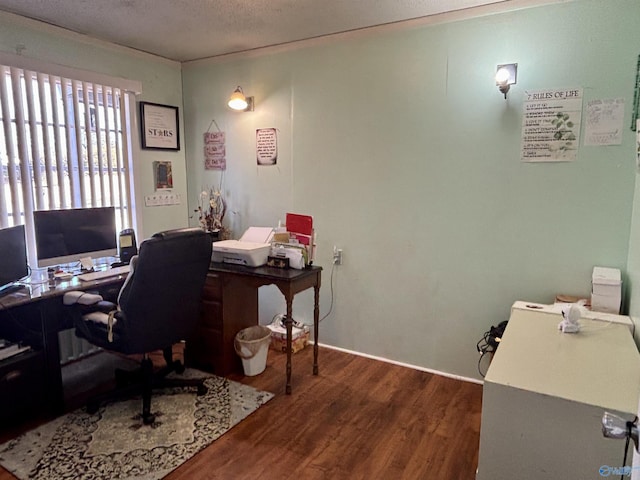 office with a textured ceiling and wood finished floors