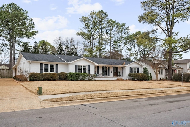 single story home with covered porch