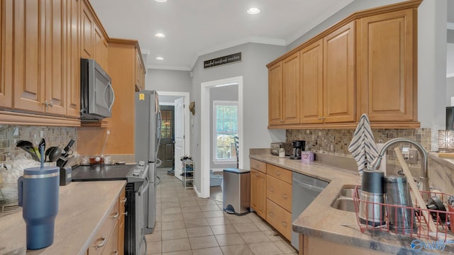 11266 Maggie Lou Dr, Tanner, AL 35671 - kitchen featuring stainless steel appliances, recessed lighting, backsplash, light tile patterned floors, and a sink