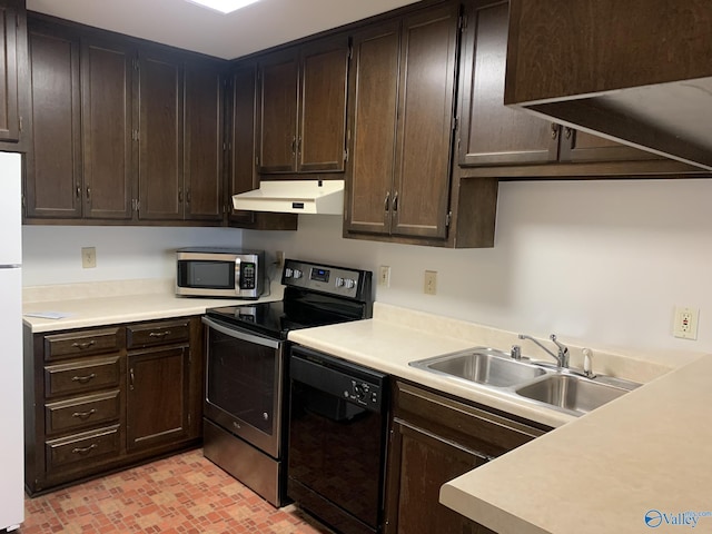 kitchen featuring dark brown cabinetry, sink, and stainless steel appliances