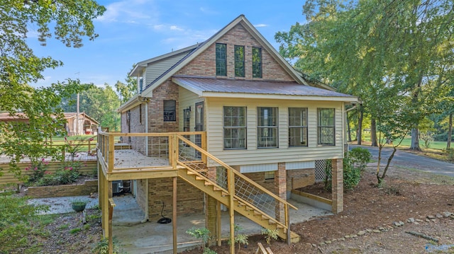 17207 County Road 22, Centre, AL 35960 - rear view of property with stairs, metal roof, and a deck