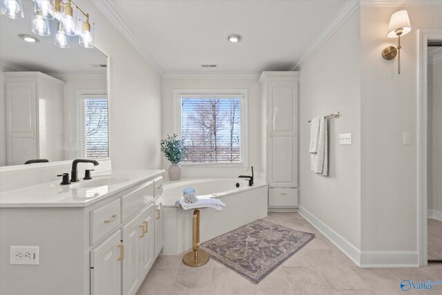 bathroom with tile patterned flooring, vanity, plenty of natural light, and crown molding