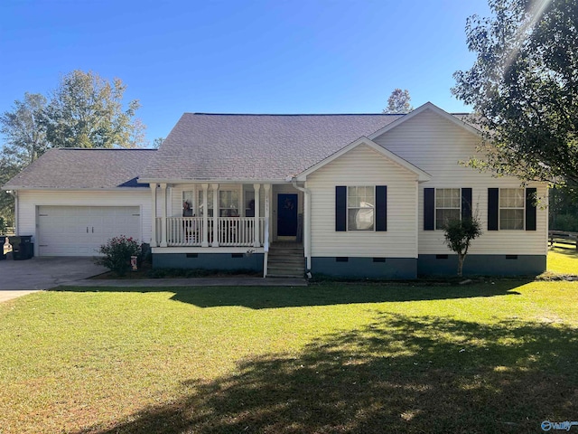 single story home featuring a porch, a front yard, and a garage