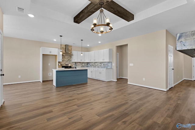 kitchen featuring recessed lighting, light countertops, electric range, white cabinets, and wall chimney exhaust hood