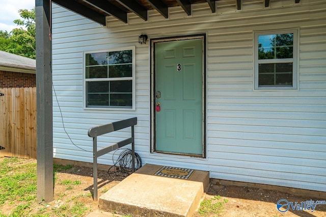 entrance to property with fence