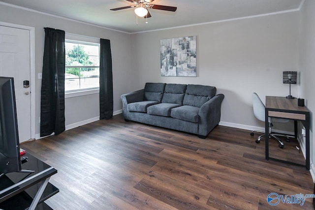 interior space with ornamental molding, a ceiling fan, baseboards, and wood finished floors