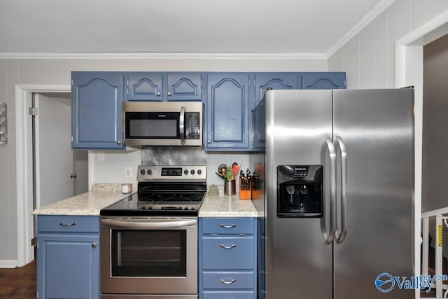 kitchen with stainless steel appliances, blue cabinets, dark wood-type flooring, and ornamental molding