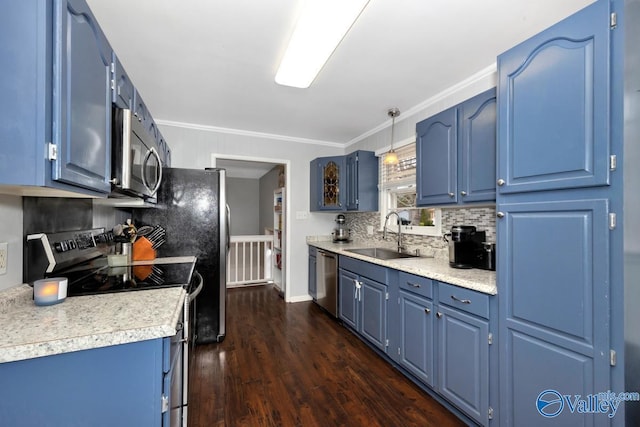 kitchen featuring blue cabinets, stainless steel appliances, and a sink