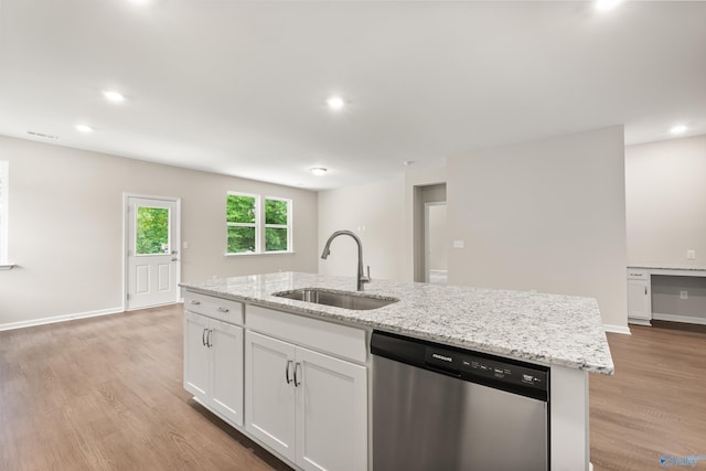 34 Aurora Cir, Fayetteville, TN 37334 - kitchen featuring stainless steel dishwasher, a sink, light wood-style flooring, a center island with sink, and white cabinetry