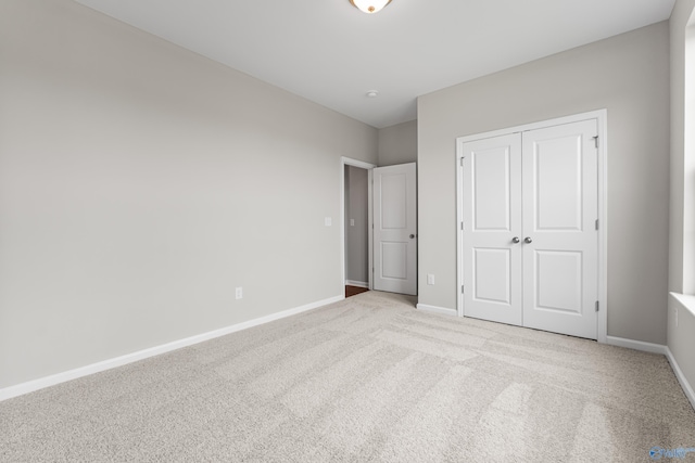 34 Aurora Cir, Fayetteville, TN 37334 - unfurnished bedroom featuring carpet flooring, baseboards, and a closet