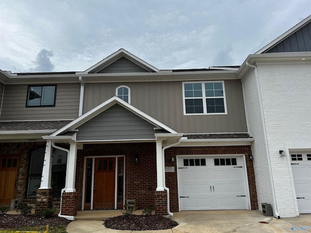 craftsman inspired home with a garage