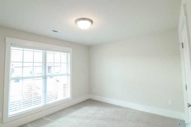 view of carpeted spare room