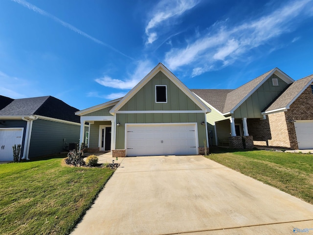 craftsman house with central AC unit, a porch, a garage, and a front lawn