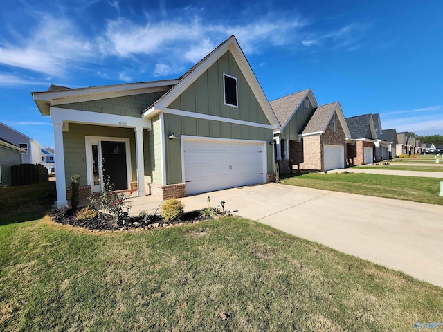 craftsman-style house featuring a front lawn and a garage