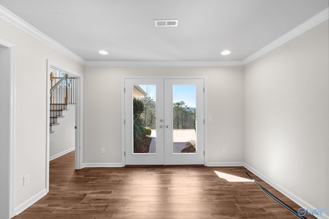doorway to outside with dark wood-style floors, french doors, and baseboards