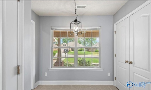 unfurnished dining area featuring a healthy amount of sunlight